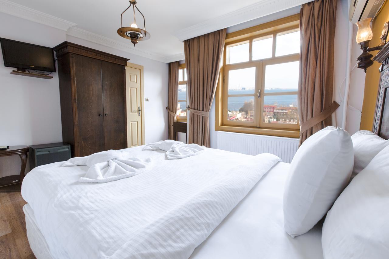 Cheers Vintage Hostel イスタンブール エクステリア 写真 A bedroom in a hotel